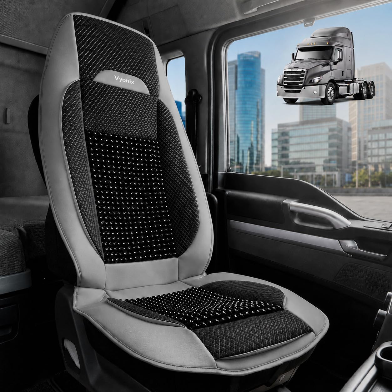 Dark grey Vyonix beaded seat cover fitted to a semi truck driver seat