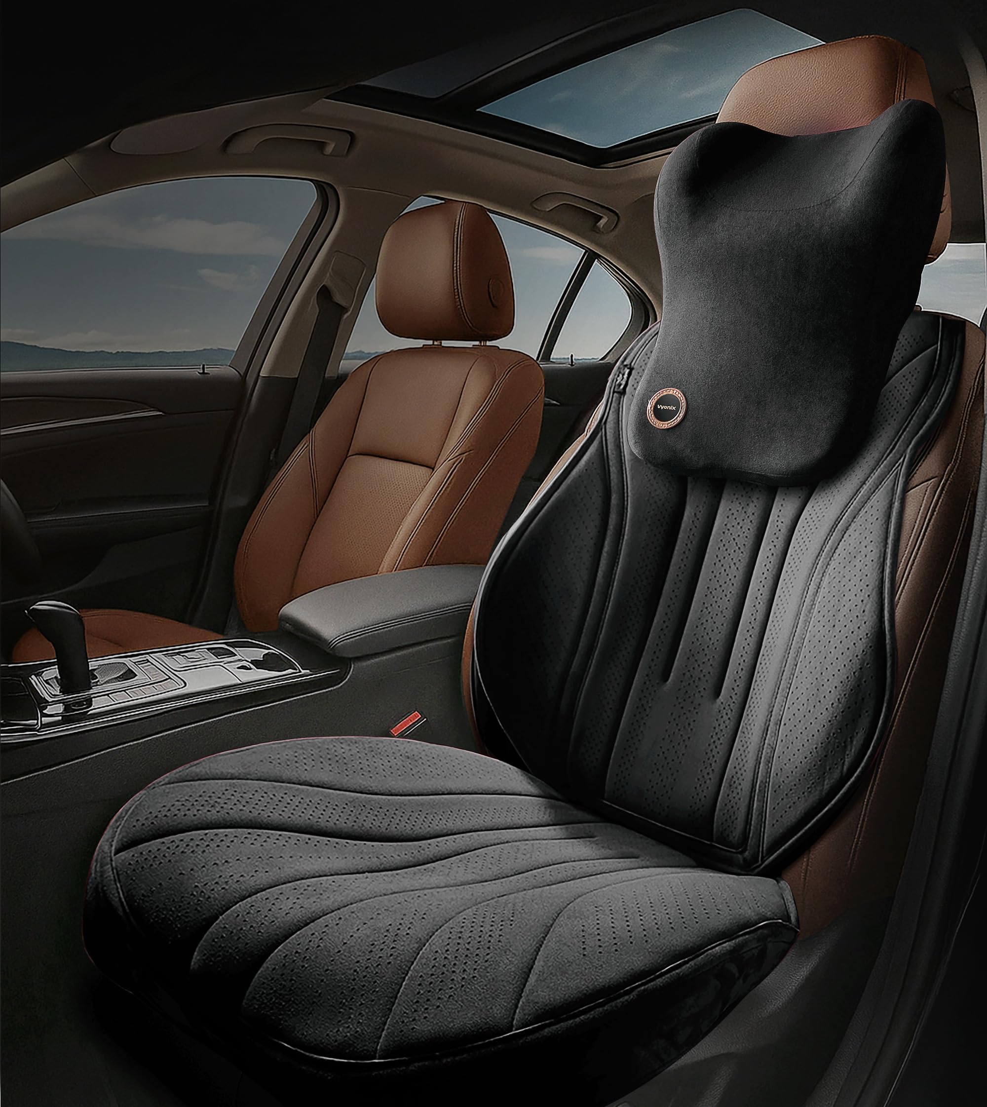 Vyonix perforated suede car seat cushion with back and neck support, installed on a car driver seat